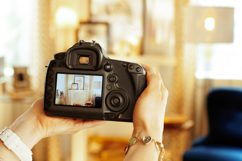 someone taking a good photo of a living room